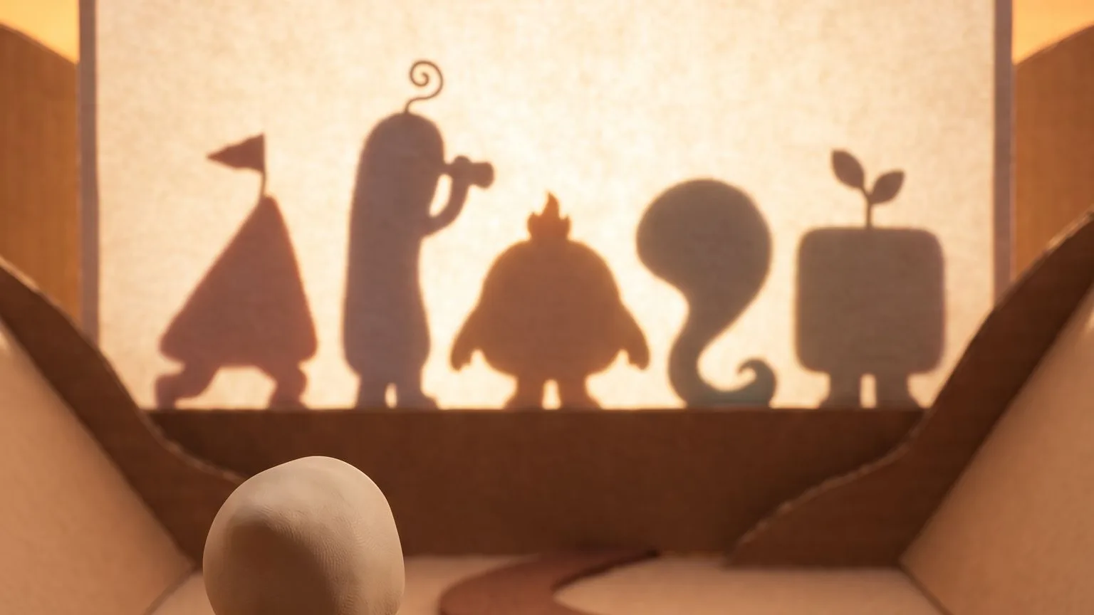 Clay diorama at sunset: behind a glowing paper screen, five shadow silhouettes stand in a row, a triangle with a flag, a tall figure with a spyglass, a round one with a flame, a swirl and a block with a sprout. The top of a small traveler's head shows at the bottom of the frame.